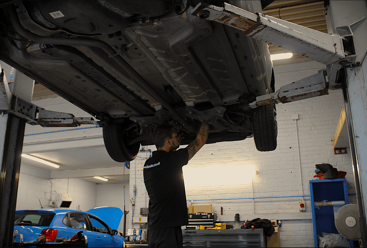 Mechanic working on a car